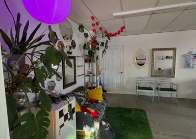 Interior of Green Room tattoo showing art and decor of studio
