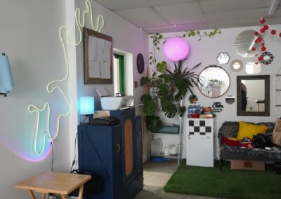 Interior of Green Room tattoo showing art and decor of studio